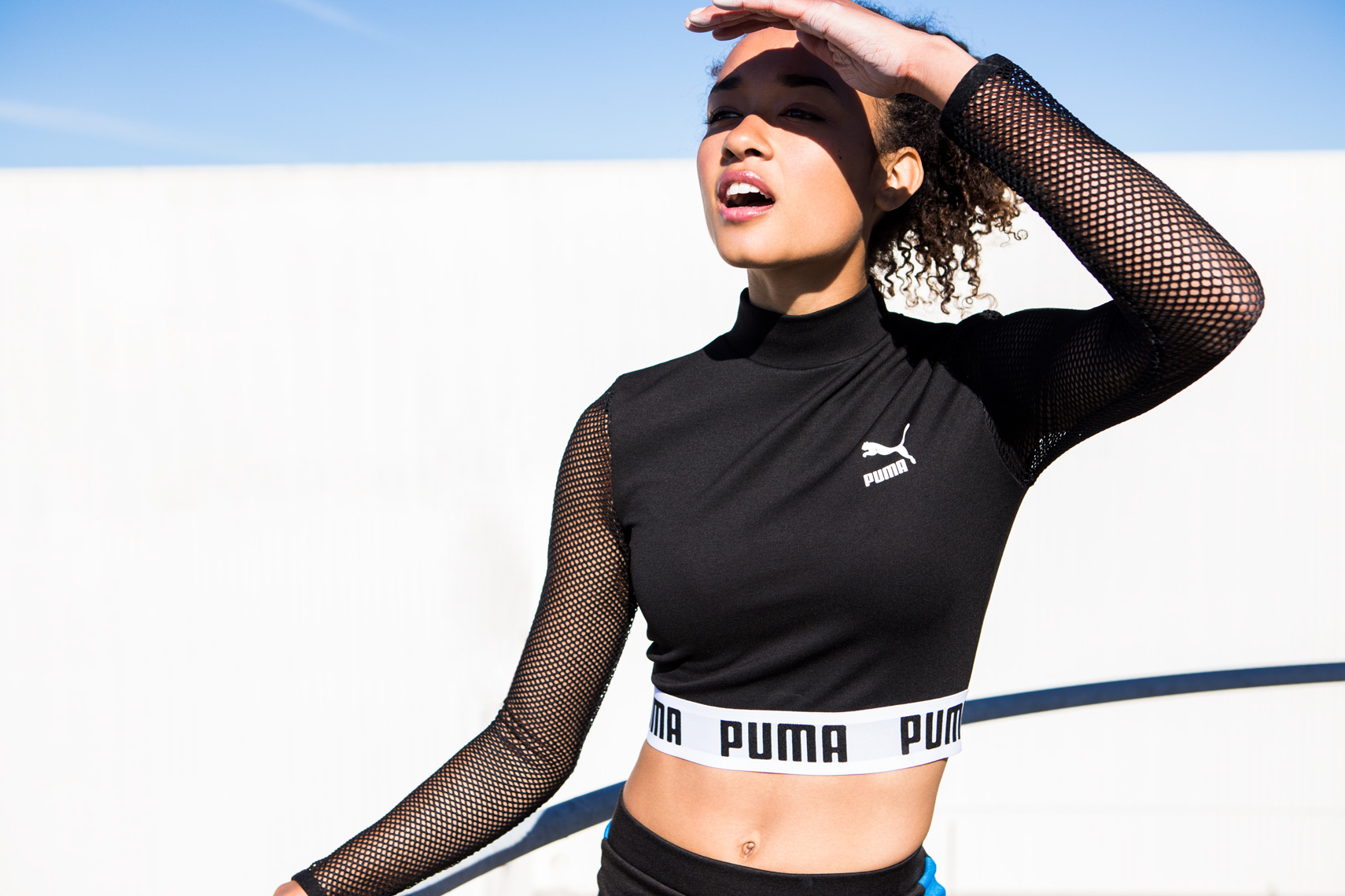 Athletic girl in Puma crop top 